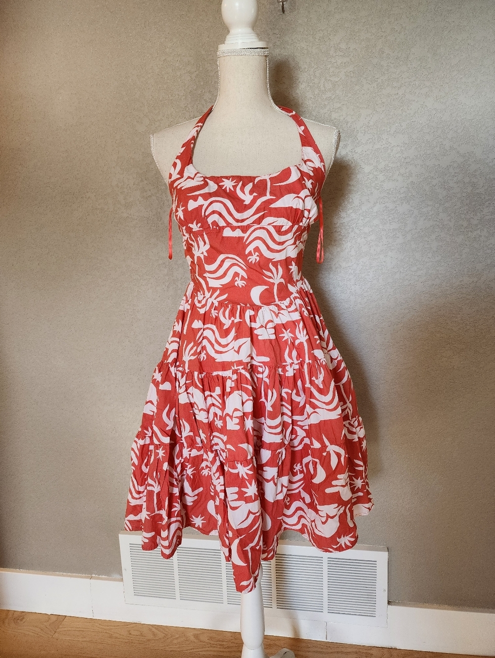 Daniella Manini x Celandine Tiered Bustier Mini Dress featuring a halter. Size S